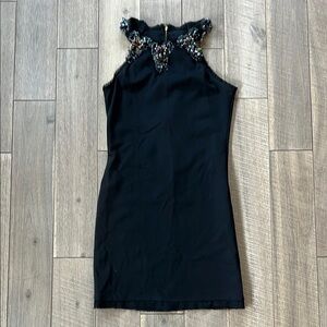 Christina Makowsky Elegant Black Sleeveless Dress with Embellished Neckline